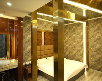 페이판자리 선라이즈 호텔 - 옌볜 - 침실