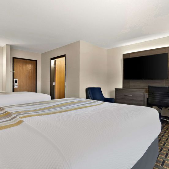 Bedroom view of SureStay Plus Hotel by Best Western Tulsa East