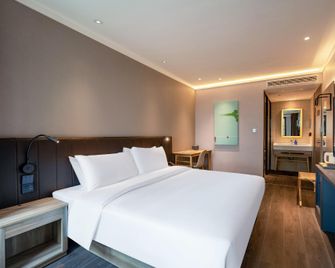 Hanting Premium Hotel Hanzhong Railway Station South Square - Hanzhong - Habitación