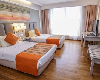 Kingwood Hotel Kuching - Kuching - Makuuhuone