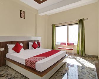Hotel O Amrit Homestays - Dhaliara - Bedroom