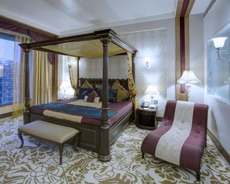 Royal Tulip Navi Mumbai - Navi Mumbai - Schlafzimmer