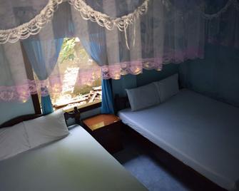 Island Smiles Homestay - Hôi An - Chambre