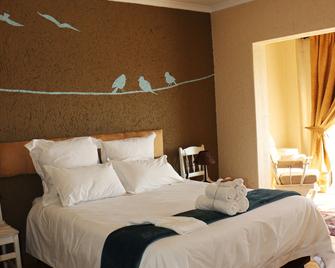 White Linen Guesthouse - Tierpoort - Habitación