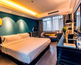 Orange Hotel Nanjing Xinjiekou Zhangfuyuan Metro Station - نانجينغ - غرفة نوم