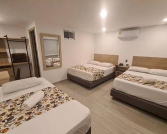 Hotel Suramericana - Medellín - Bedroom
