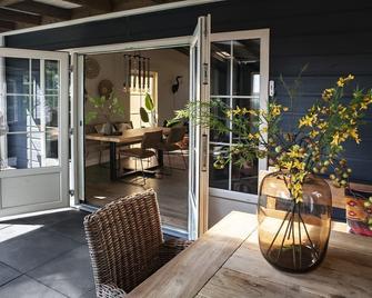 Lovely spacious 5 person chalet in the middle of the Heydeveld - Uden - Balkon