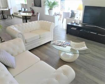 Hotel Les Jardins de Bormes - Bormes-les-Mimosas - Huiskamer