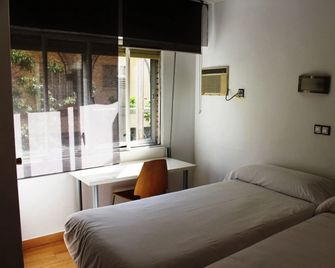 Hostal Al-Andalus - גרנדה - חדר שינה