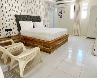Hotel1325 - Baní - Bedroom