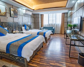 Zhangjiajie Mr.F Boutique Hotel (Tianmen Mountain Cableway Station) - Zhangjiajie - Habitación