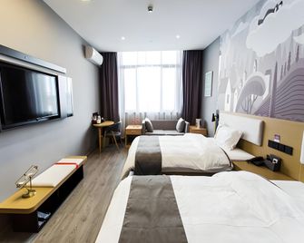Thank Inn Hotel Zhejiang Huzhou Deqing County Xinshi Town Huancheng Xi Road - Huzhou - Slaapkamer