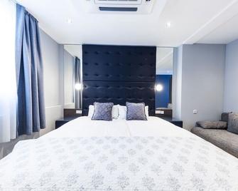 Hotel Tommasi - Mörfelden-Walldorf - Schlafzimmer