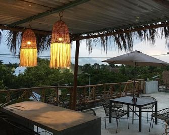 Black flamingo - Holbox - Balcón