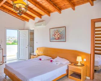 Paul's Garden Studios - Kolympia - Schlafzimmer