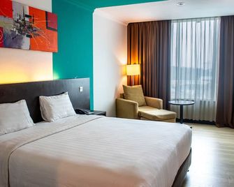 King's Hotel Nagoya Batam - Batam - Bedroom