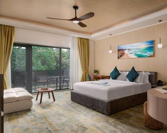 สไมล์ บูทีคโฮเทล บาย อีเอชเอ็ม - พนมเปญ - ห้องนอน