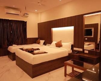Hotel Sahaya Arasi - Kanyakumari - Спальня