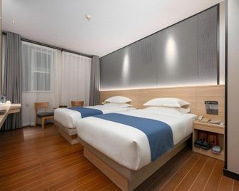 Wenxing Hotel Guangzhou Huashi Branch - Guangzhou - Bedroom