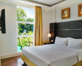 Aston Bogor Hotel and Resort - בוגור - חדר שינה