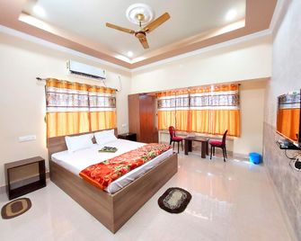 Aappayan Guest House & Restaurant - Bolpur - Bedroom