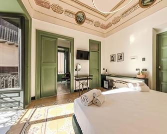 Palazzo Villelmi - צ'פאלו - חדר שינה