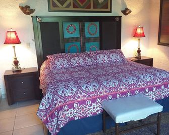 Casa Flores Bed Breakfast - اجيجيك - غرفة نوم