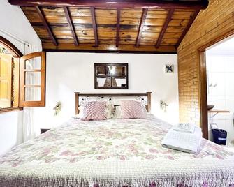 فيلين بوسادا ريكانتو دا ناتوريزا - Monte Verde - غرفة نوم