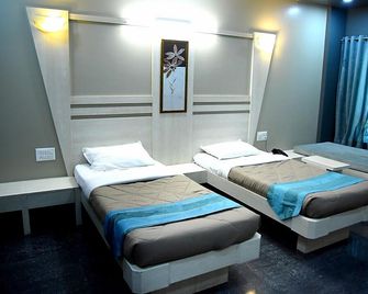 Lotus Hotel - Solāpur - Bedroom