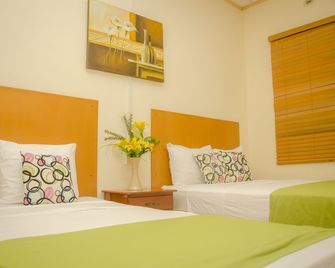 Hotel Residencial Cervantes - David - Schlafzimmer