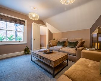 At Home Apartments - Shrewsbury - Living room