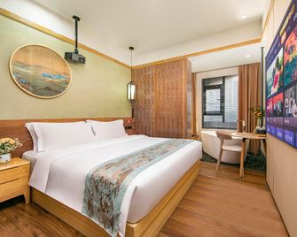 Fujian Enze Xiaozhu Hotel - Fuzhou - Bedroom