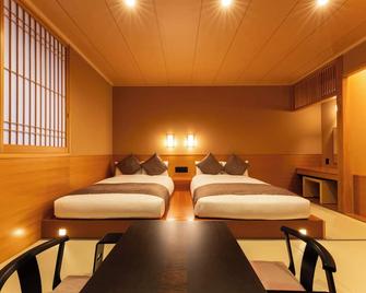 Temple Town Hotel Waqoo Horyuji - Ando - Slaapkamer