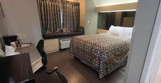Americas Best Value Inn & Suites Jackson, Tn - Jackson - Bedroom