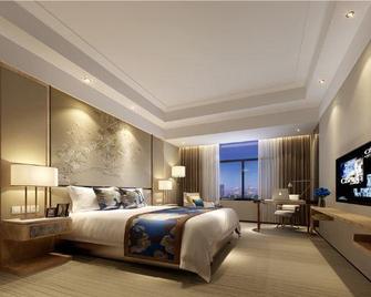 New Plum Garden Seasons Hotel - Shenzhen - Habitació