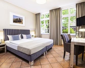 Hotel Hinrichs - Wittmund - Bedroom