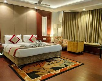 Hotel 5 Flowers Ananta Elite - Kota - Bedroom