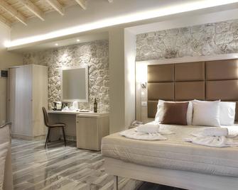 Porto Demo Hotel - Agios Georgios Pagon - Bedroom