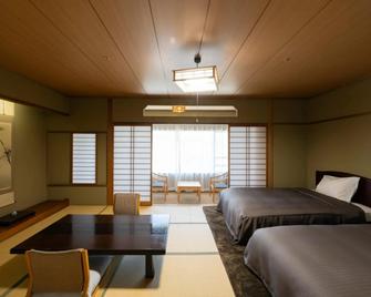 Isawa Tokiwa Hotel - Fuefuki - Slaapkamer