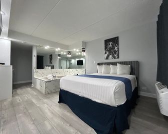 Rainbow Motel - Summit - Camera da letto