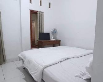 Spot On 92635 Homestay Baiturrahmah Syariah - Пеканбару - Спальня