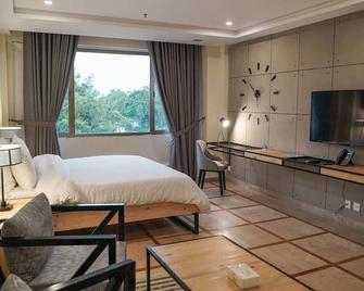 Roomy Signature Hotel - Islamabad - Bedroom