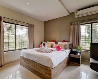 Kohinoor Exotica - Lonavala - Lonavala - Yatak Odası