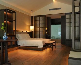 Lotus Yard Zen Hotel - Suining - Chambre