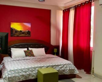 Sm Premier Hotel - Afienya - Habitación