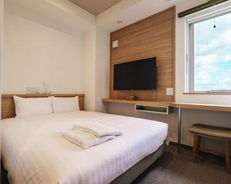 Stay Living Niseko - Куттян - Спальня