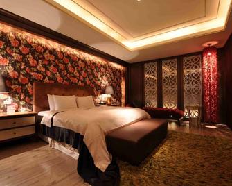 Li Hsin Motel - Taichung - Camera da letto