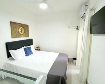 Pousada Village Cozumel - Guarujá - Bedroom