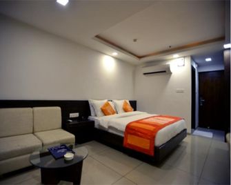Shagun Hotel - Vadodara - Schlafzimmer