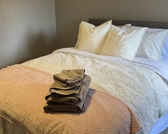 Updated, fully furnished home in the heart of uptown Butte. - Butte - Bedroom